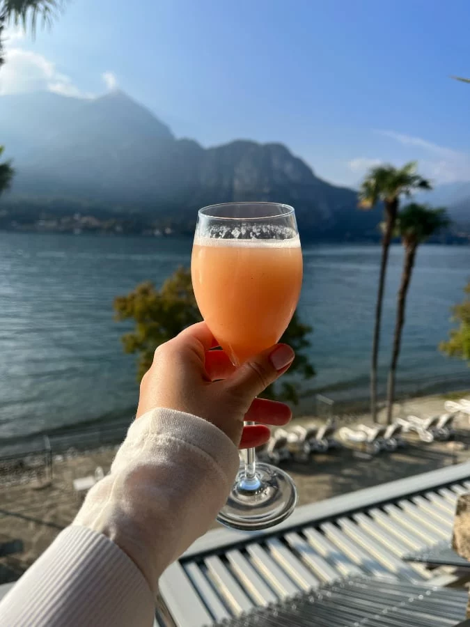 Bellini cocktail by Lake Como, Italy