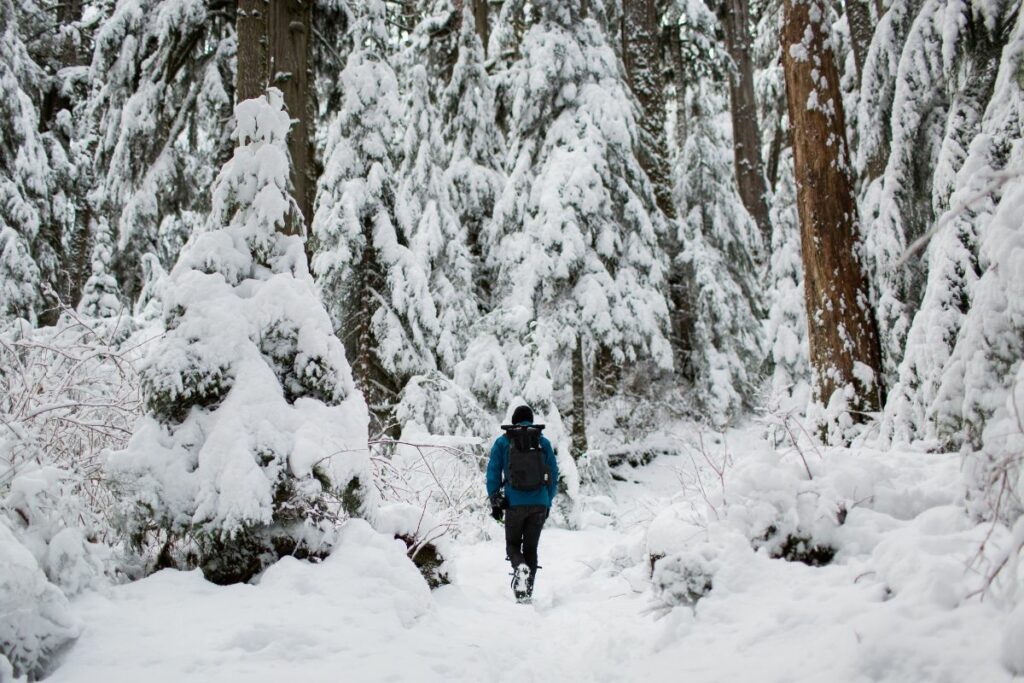 Man hiking on winter snow