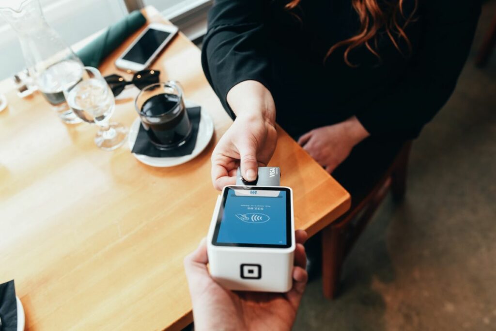 Woman using credit card